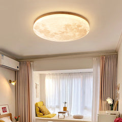 Angled view of the wood-rimmed round moon flush mount ceiling light