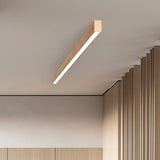Warm white LED glow along the length of the wood grain bar