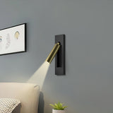 Bedside reading light mounted over a wooden floating nightstand
