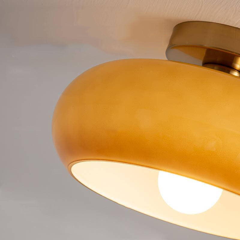 Side profile of the oval amber glass ceiling light shade