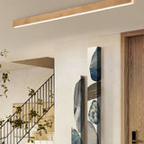 Wood grain flush mount ceiling light shown at an angled perspective