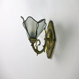 Petal glass wall sconce measured to show its height and width