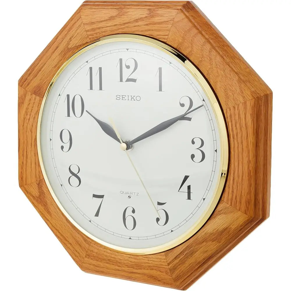 Analog Wall Clock – Seiko Traditional Octagonal Oak Design with Gold Bezel.