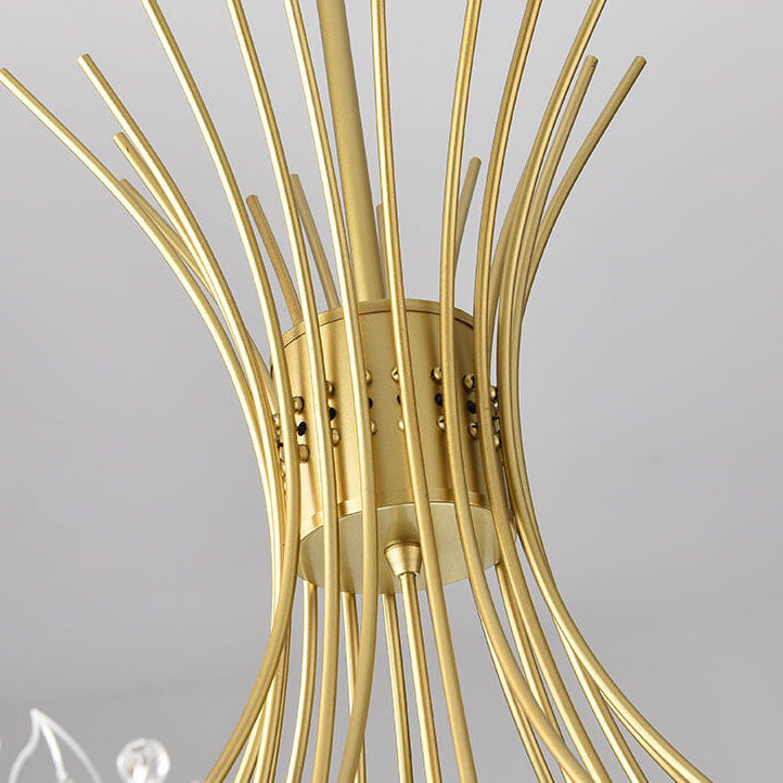 Close-up of the gold central hub and canopy of the chandelier