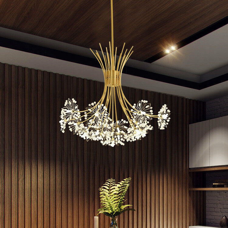 Wide gold sputnik chandelier against a wood-panelled dining room wall