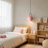 Sunny yellow ball pendant light casting a warm downward glow