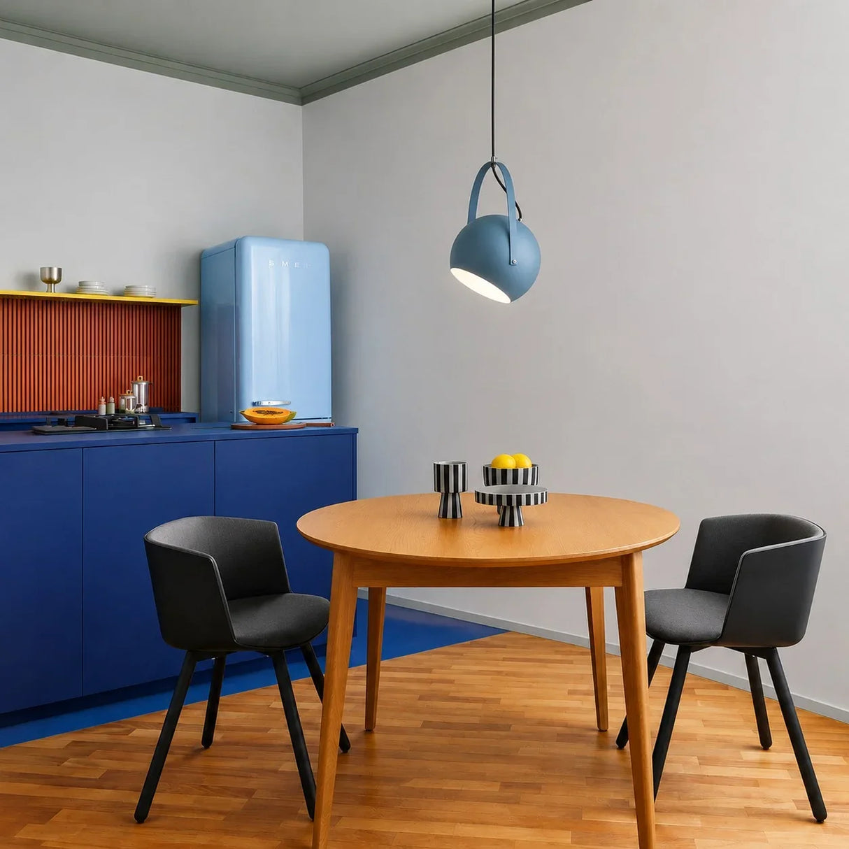 Muted colour ball pendant lights shown side by side in a colour range