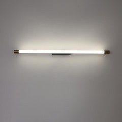 Detail of the black rectangular mounting backplate on the wall sconce