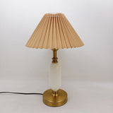Full pleated shade table lamp with a slim white column base
