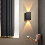 Wall sconce shown mounted with light beams above and below