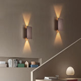 Up and down wall sconce showing its narrow depth from the side