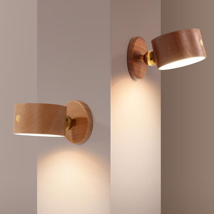 Beech and walnut wall sconce finishes displayed side by side