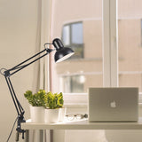 Retractable swing arm clip lamp shown fully extended on a plain background
