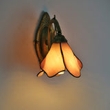 Full view of the vintage petal stained glass wall sconce fixture