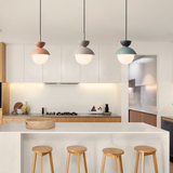 Dark blue macaron pendant light with frosted glass globe diffuser