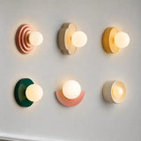 Close view of the frosted glass globe set in a round wall backplate