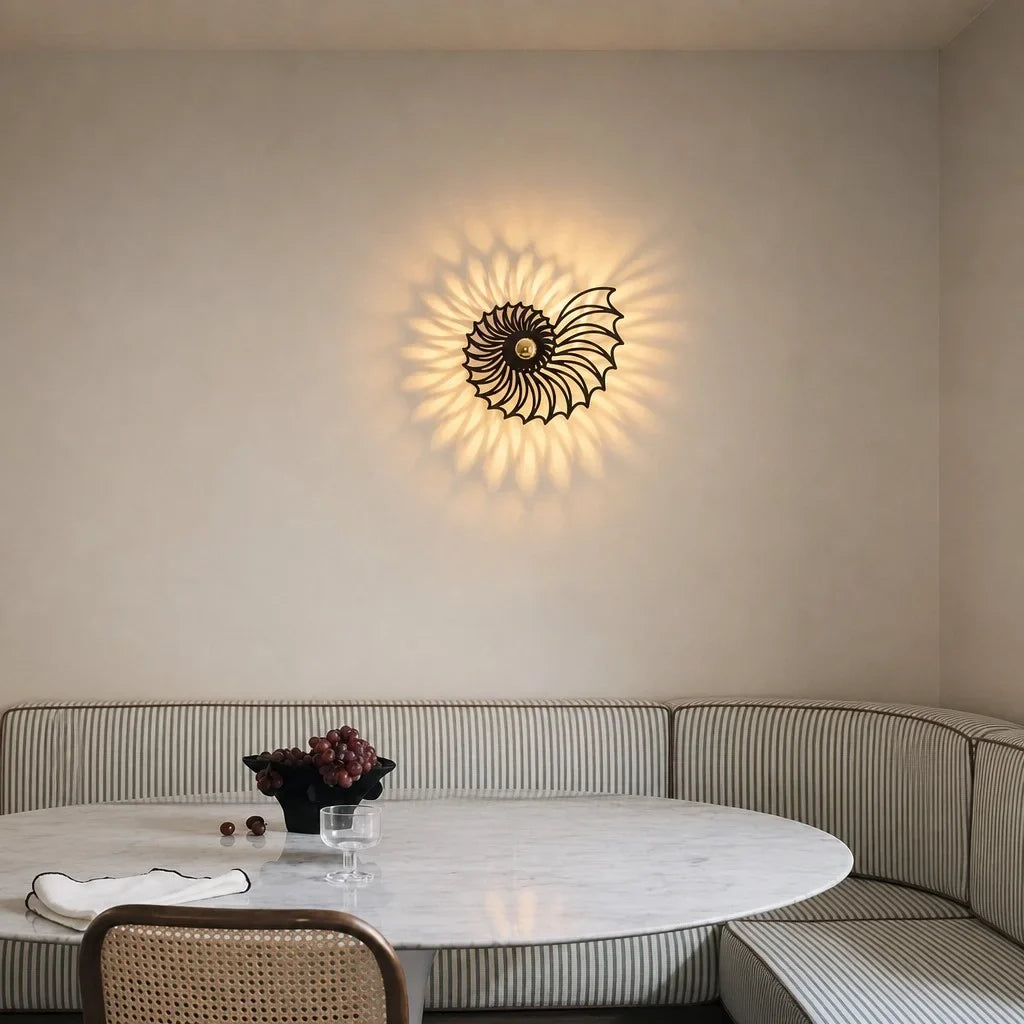 Close view of the shell wall light spiral form