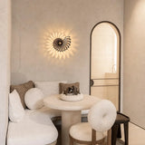 Shell wall light glowing with warm integrated LED