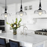 Retro glass flower pendant light with black body and clear shade