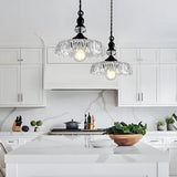 Detailed look at the floral cut pattern of the glass pendant shade