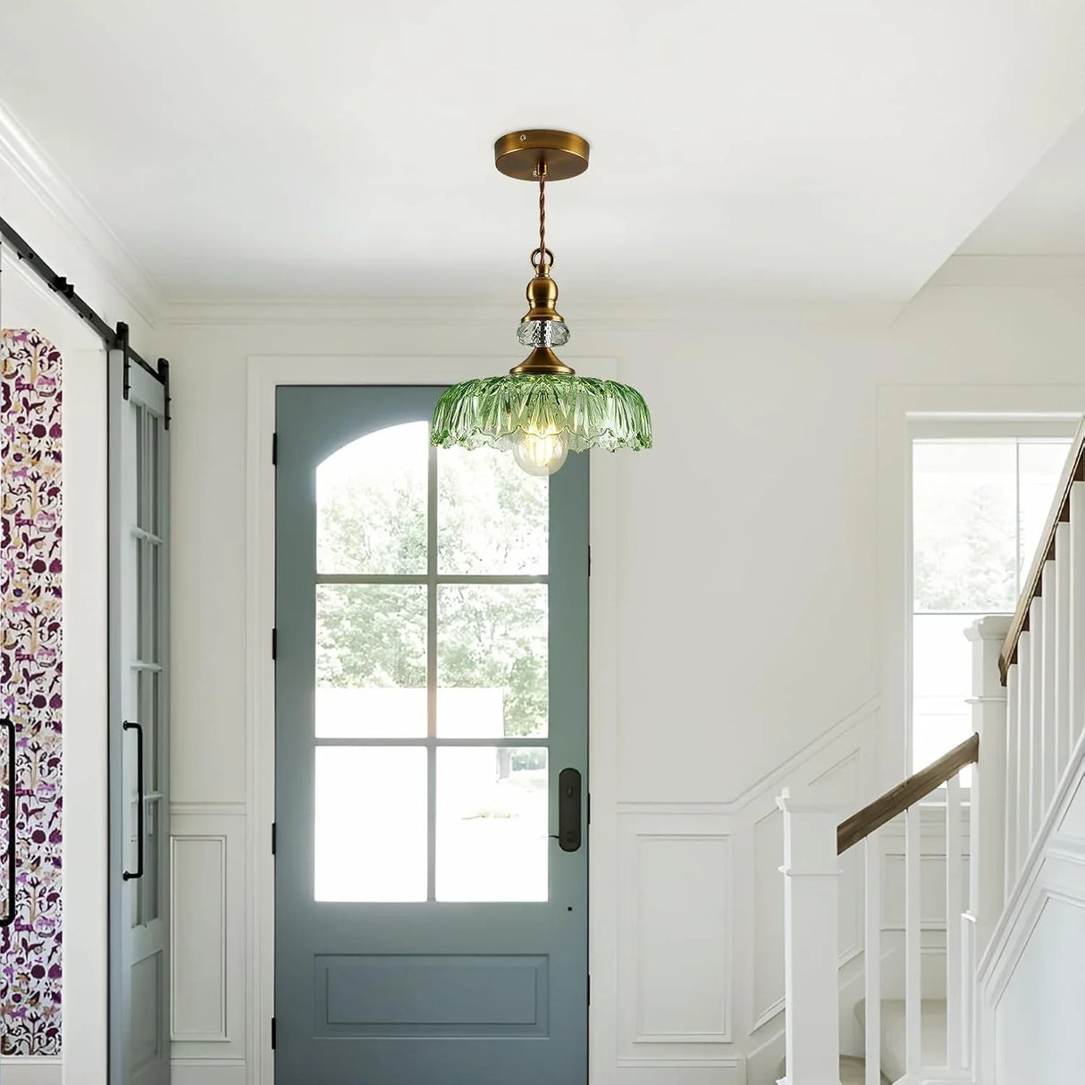 Detail of the twisted cord and brass fitting on the flower pendant light