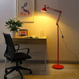 Side view of the iron cone shade and articulated task arm on the floor lamp