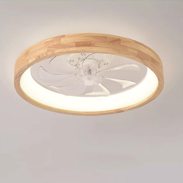 Wood flush mount ceiling fan light seen from below while lit