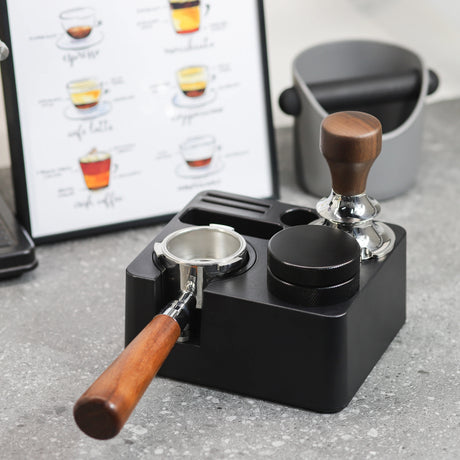 Portafilter tamping stand showing compact design and non-slip base