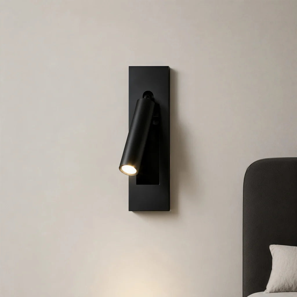 Modern rotating LED reading wall sconce with cylindrical spotlight head and slim backplate