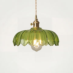 Tulip glass pendant light on a plain studio background