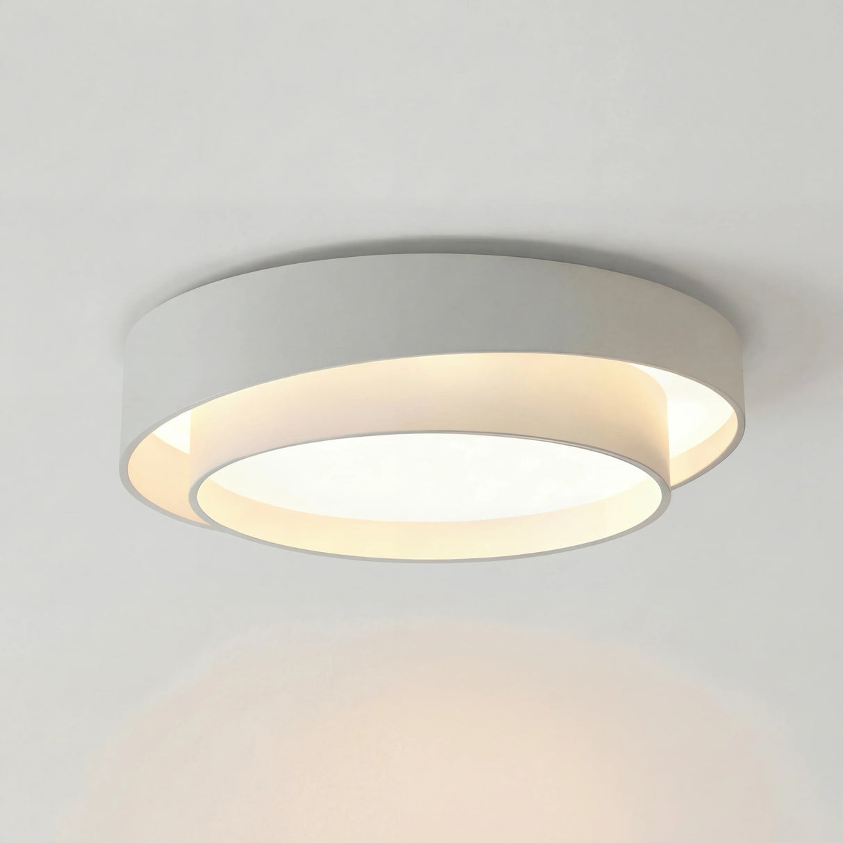 Disc ceiling light shown against a plain background