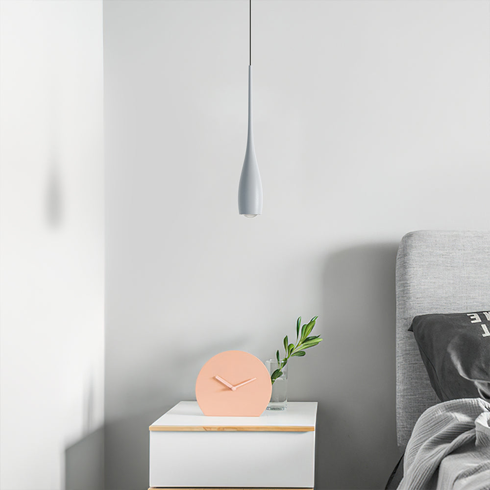 Aluminium water drop pendant light against a soft neutral backdrop