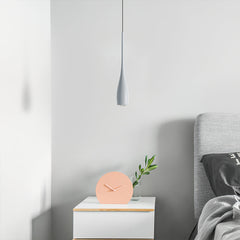 Aluminium water drop pendant light against a soft neutral backdrop