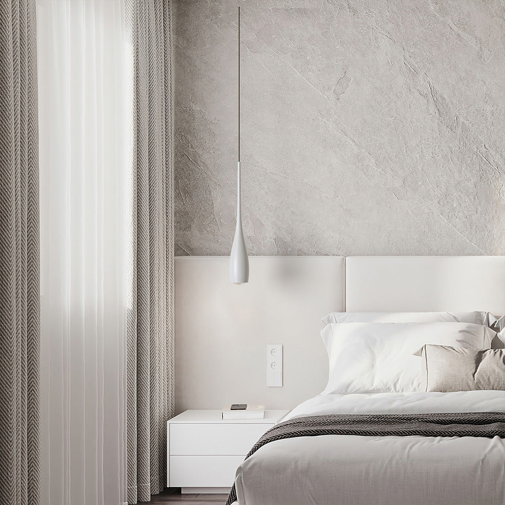 Minimalist teardrop pendant light with warm ambient lighting