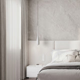 Minimalist teardrop pendant light with warm ambient lighting