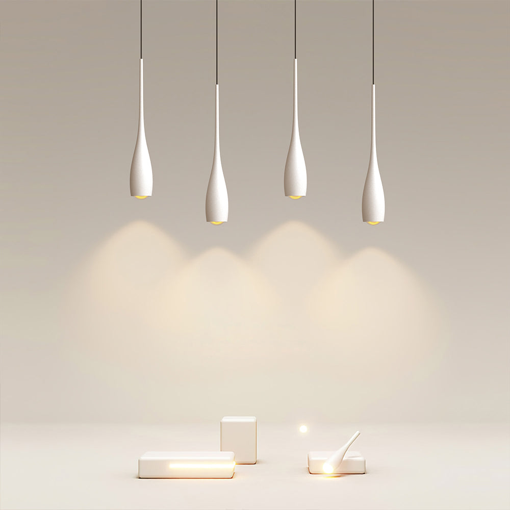 Teardrop pendant light grouped as a decorative lighting arrangement