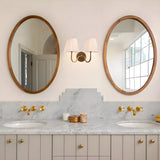 Wall sconce with curved U-shaped arm and flush circular wall mount plate, dusty blue shade front view 21