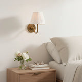 Chrome-finish wall sconce with pleated linen shade and slim curved arm, mustard yellow shade catalogue image 10