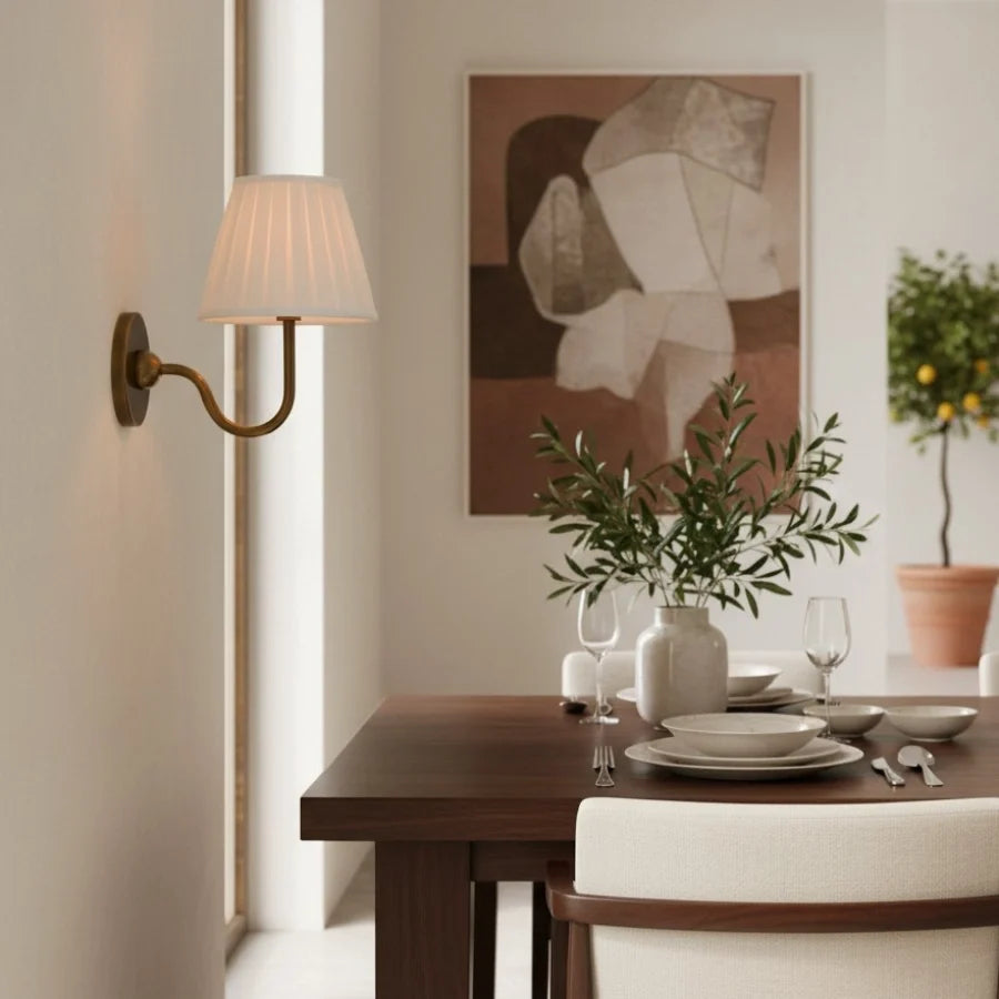 Rustic metal wall sconce with pleated shade against a neutral backdrop, dusty blue shade lit shot 15