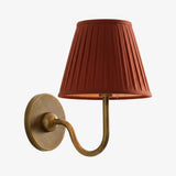 Chrome-finish wall sconce with pleated linen shade and slim curved arm, mustard yellow shade catalogue image 40