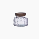 Glass pantry storage jars with lids shown on its side