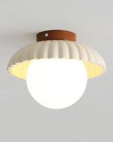 Beige and red colourway of the flower-bud ceiling light shade