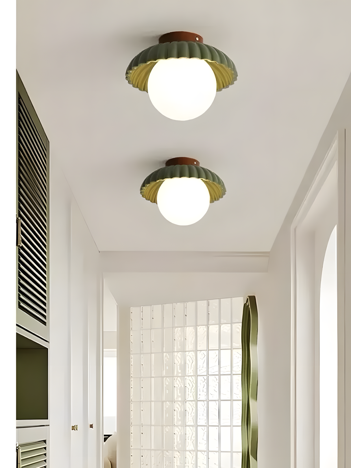 Side profile of the compact ceiling light with opal glass globe