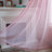 Light filtering crochet curtain panel styled for relaxed boho interiors
