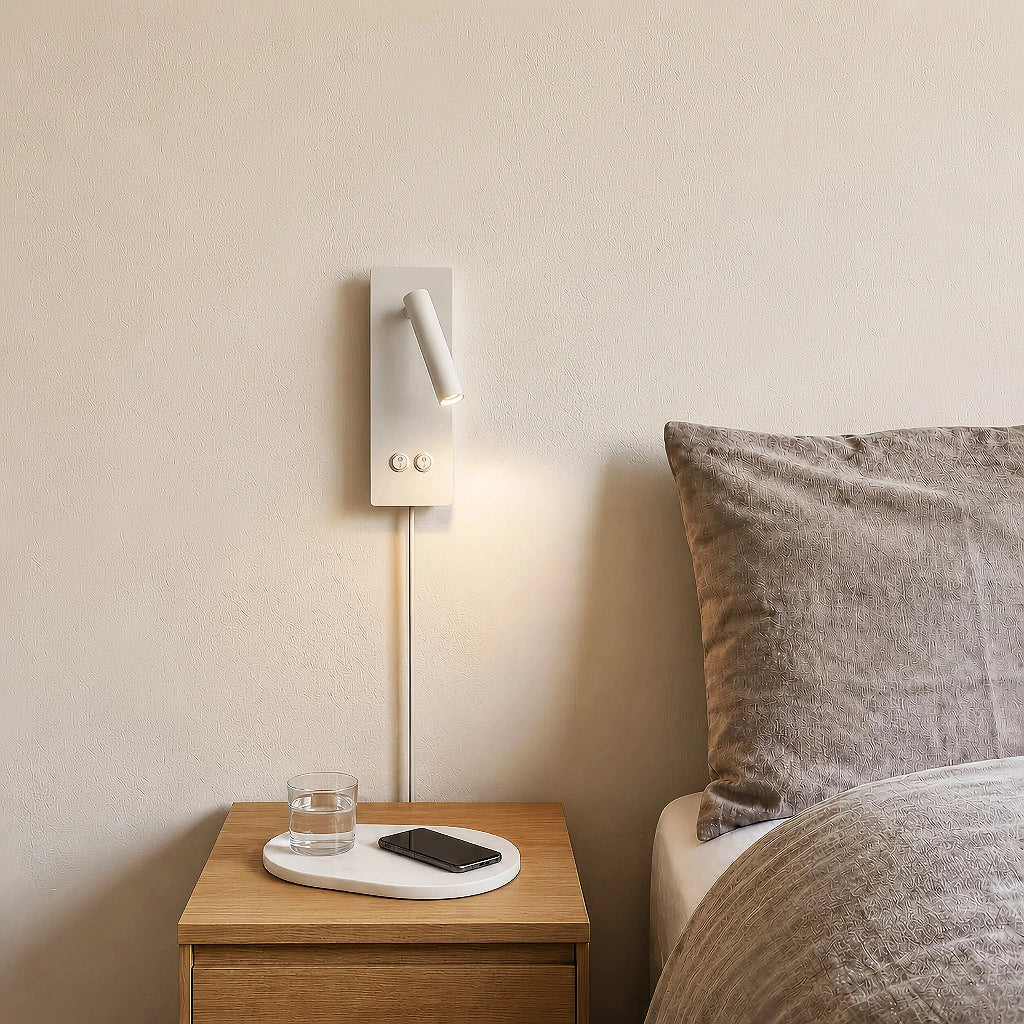 Surface-mount reading wall sconce shown against a plain wall