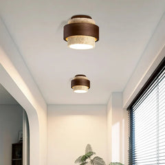 Travertine ceiling light detail showing the GX53 light aperture underneath