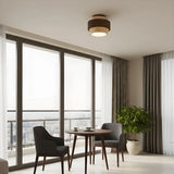 Rear three-quarter view of the tiered travertine flush mount fixture