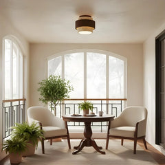 Minimalist wabi-sabi ceiling light with raw travertine and walnut tiers