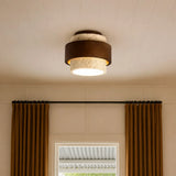 Underside of travertine ceiling light showing the diffused light aperture