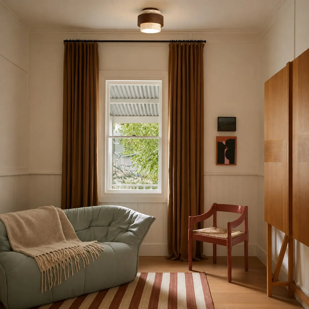 Angled view of the stacked travertine and wood ceiling light bands